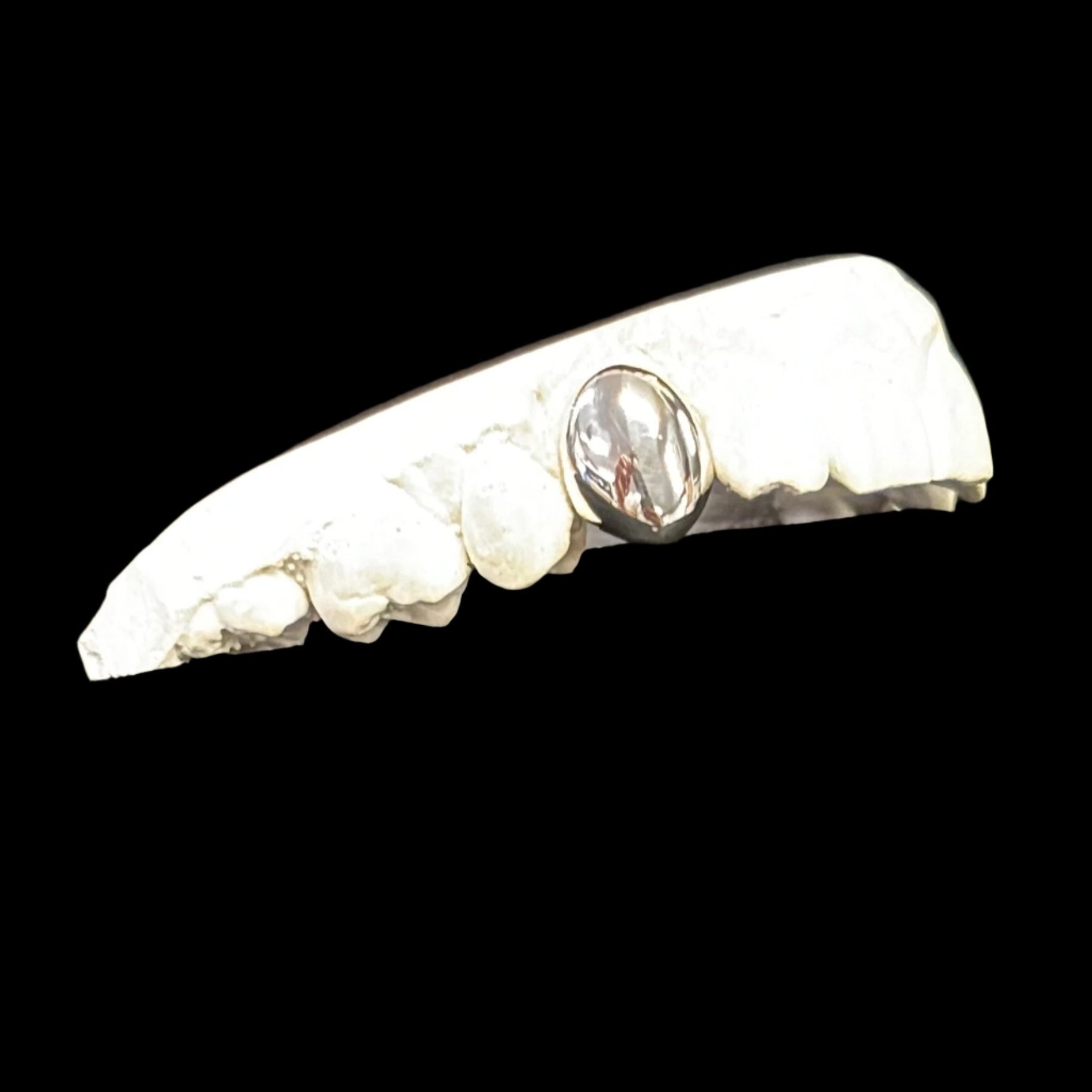 One tooth in Sterling Silver