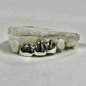 Three teeth in Sterling Silver