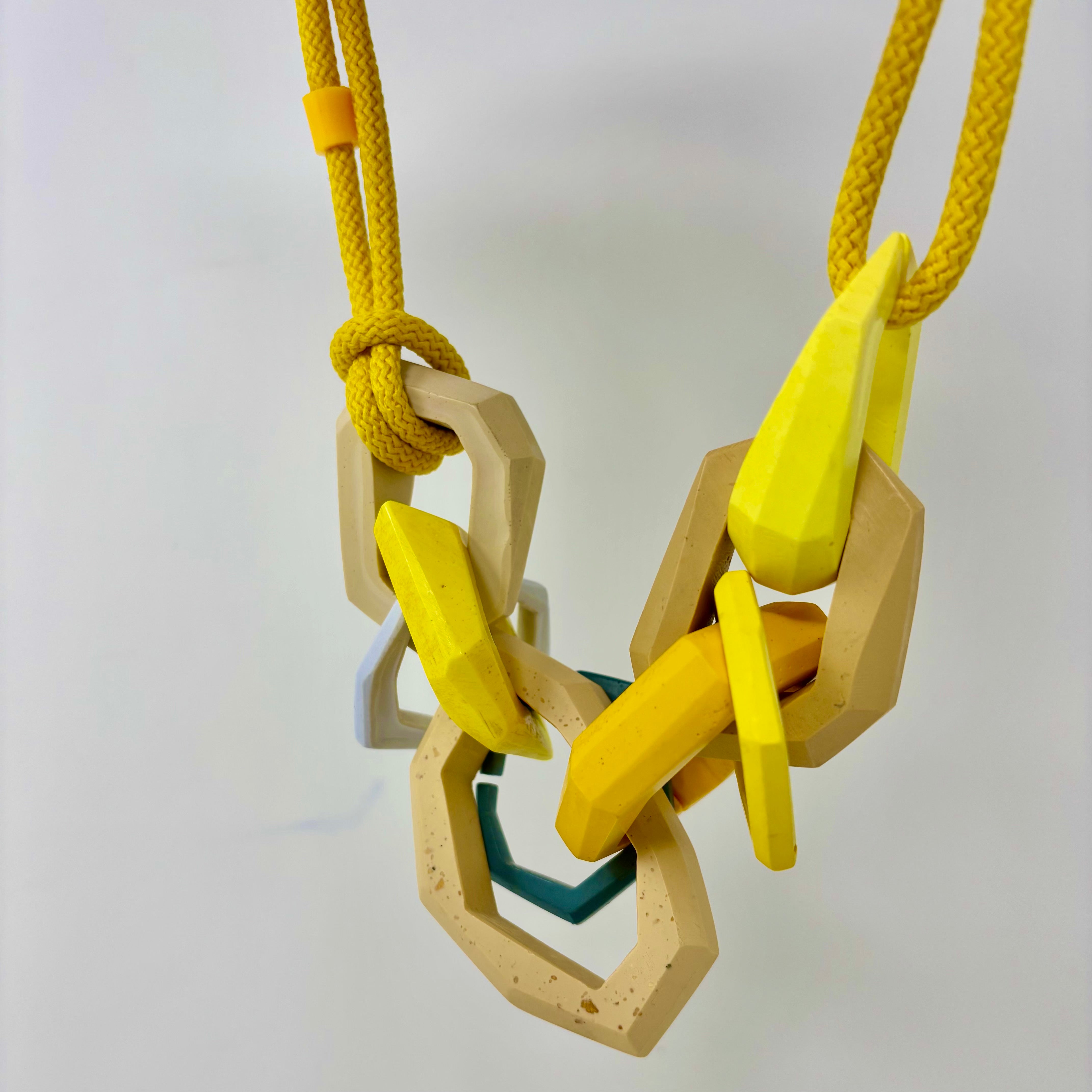 Links Necklace, 9 Links on a yellow cord