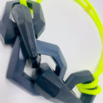 Load image into Gallery viewer, Maca Links Necklace, Charcoal Grey and fluro yellow

